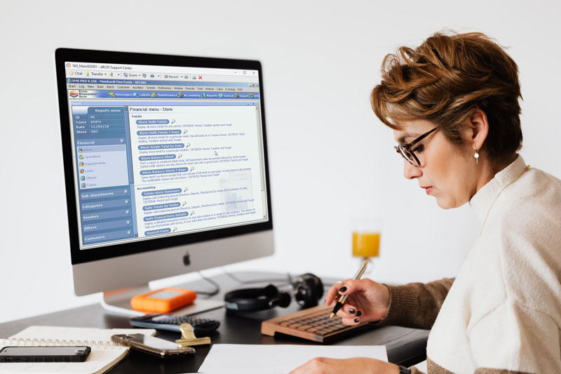 photo of woman working at a desk